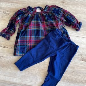Hanna Andersson plaid top and navy leggings.
